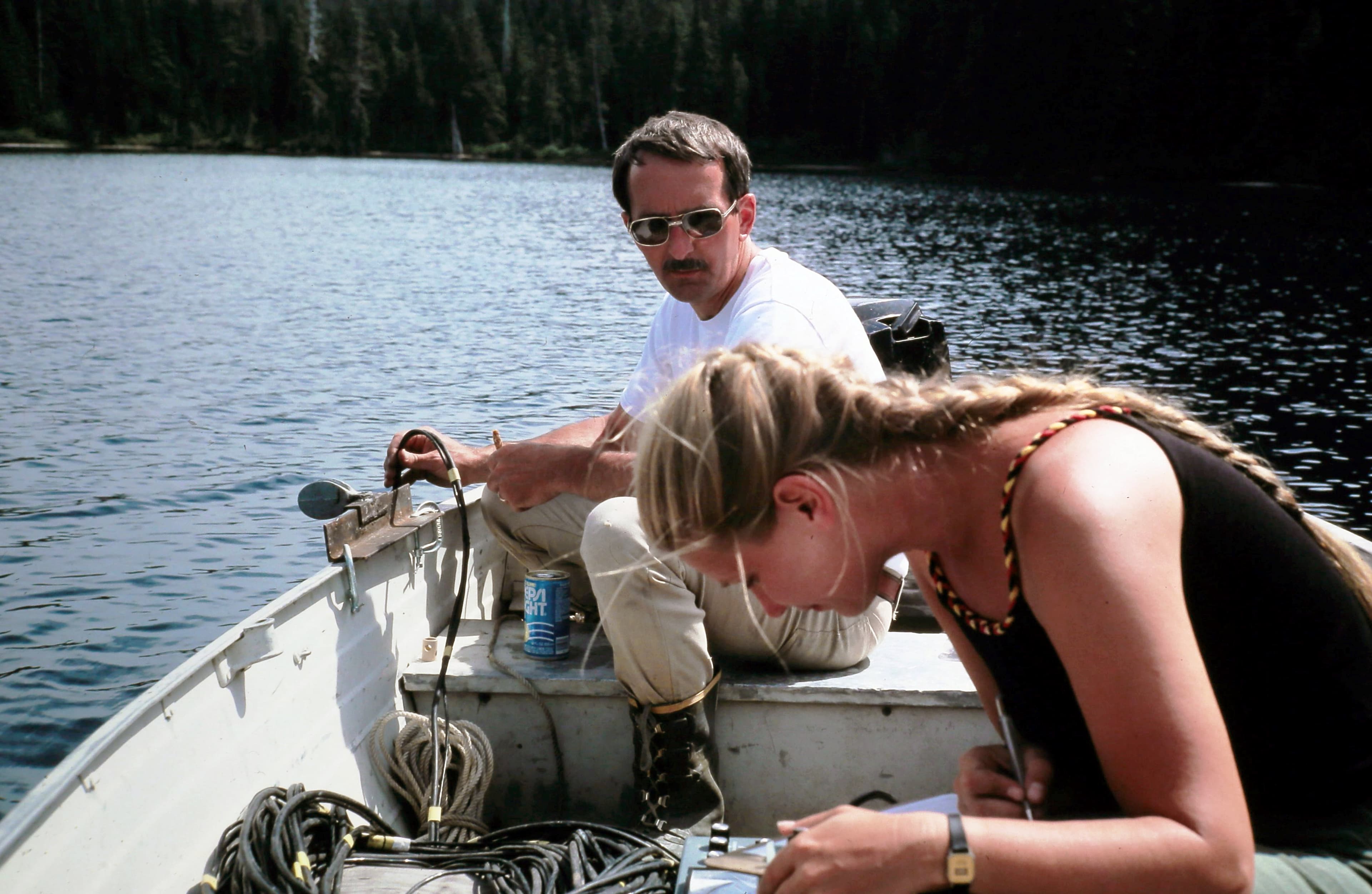 July 20, 1982 - N.P. Dion and S.S. Embrey reading Dissolved Oxygen levels at Deadmans Lake, 12.7 miles NNE of the vent and just beyond the blast zone. Deadmans served as the control in the lakes study.  USGS S.S. Embrey